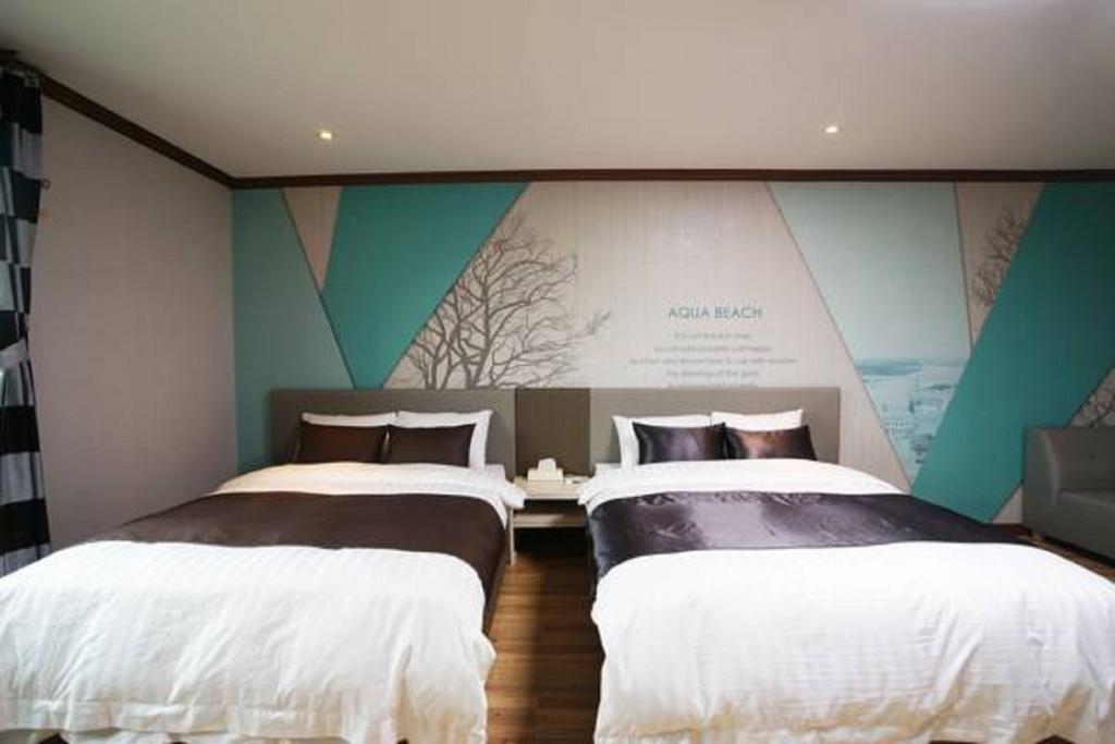 Seongsan Aqua Beach Hotel Seogwipo Ruang foto