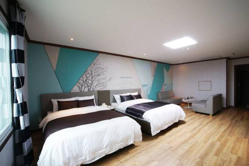Seongsan Aqua Beach Hotel Seogwipo Ruang foto