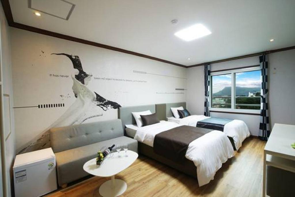 Seongsan Aqua Beach Hotel Seogwipo Ruang foto