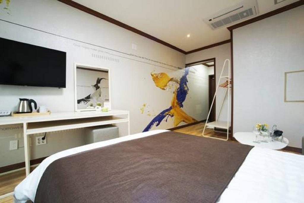 Seongsan Aqua Beach Hotel Seogwipo Ruang foto