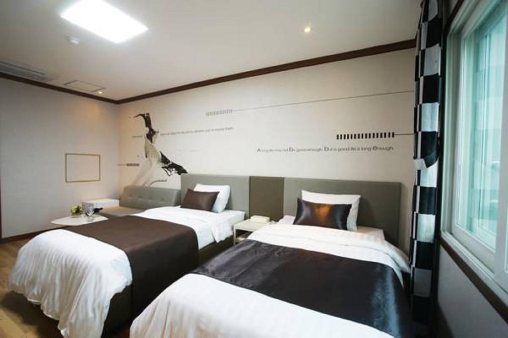Seongsan Aqua Beach Hotel Seogwipo Ruang foto